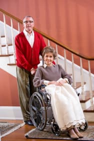 man with wife in wheelchair