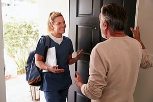 caregiver coming into the home of a patient
